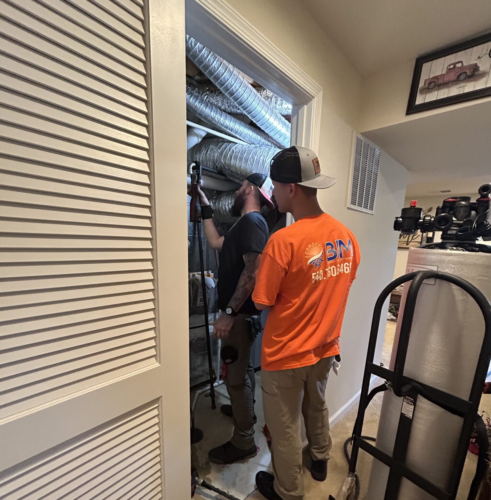 Techs in Closet - Ducts