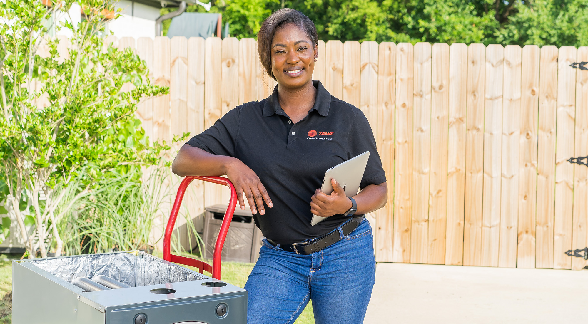BIM Heating and Cooling tech installing Trane furnace during home heating setup